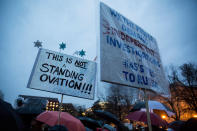 <p>Demonstrators hold signs in Lafayette Square during a rally calling for resistance to President Donald Trump on February 28, 2017 in Washington, D.C. Trump will address the joint session of the U.S. Congress tonight and is expected to focus on national security, tax and regulatory reform, the economy, and healthcare. (Zach Gibson/Getty Images) </p>