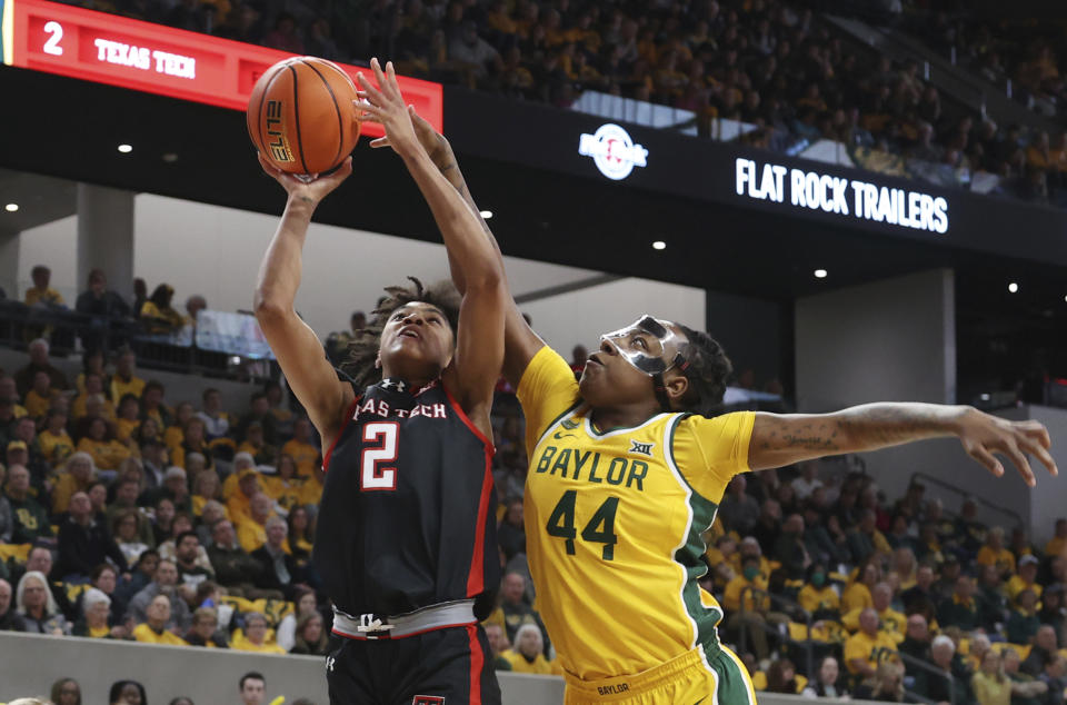 Baylor forward Dre'Una Edwards, right, pressures Texas Tech guard Kilah Freelon on her shot in the first half of an NCAA college basketball game, Sunday, Feb. 18, 2024, in Waco, Texas. (Rod Aydelotte/Waco Tribune-Herald via AP)