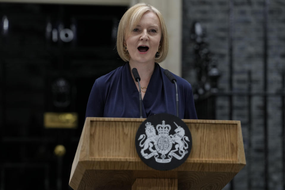 FILE - New British Prime Minister Liz Truss makes an address outside Downing Street in London Tuesday, Sept. 6, 2022 after returning from Balmoral in Scotland where she was formally appointed by Britain's Queen Elizabeth II. Britain’s new Prime Minister Liz Truss has pledged to rebuild the economy, but she faces a daunting job. Truss inherits an ailing economy on the brink of a potentially long recession, with record inflation and millions crying out for government help to cope with energy bills. (AP Photo/Kirsty Wigglesworth, File)