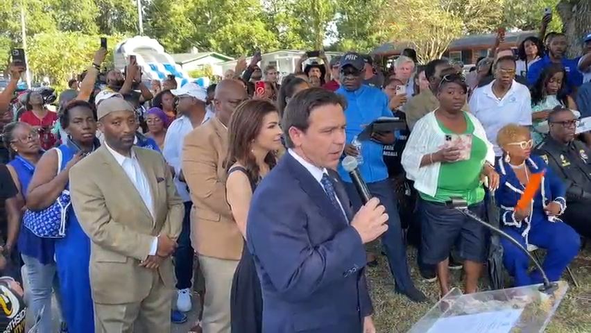 Florida Gov. Ron DeSantis was heckled as he tried to address the audience at the prayer vigil for the Dollar General store shooting victims in Jacksonville.