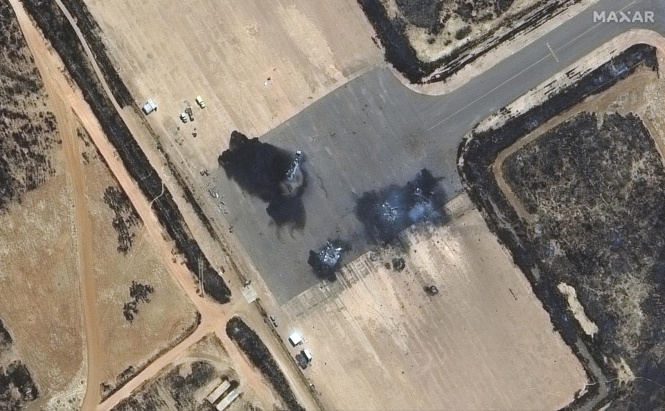 This satellite image provided by Maxar Technologies shows destroyed ground attack aircraft at El Obeid airbase, Sudan, Tuesday April 18, 2023. (Satellite image ©2023 Maxar Technologies via AP)