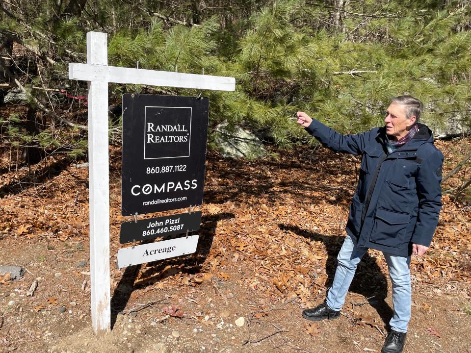 Randall Realtors Compass Realtor John Pizzi shows an available lot in Norwich on 60 Green Briar Road. The property extends to I-395.