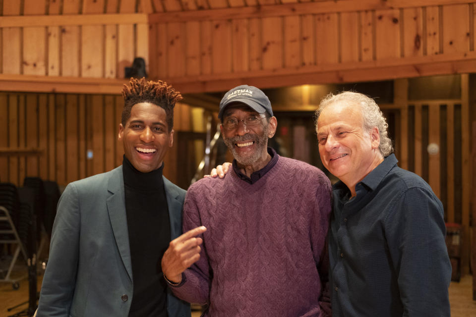 Jazz star Jon Batiste and “Finding the Right Notes” director-producer Peter Schnall flank Ron Carter