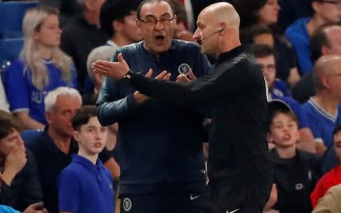 Chelsea manager Maurizio Sarri with fourth official Roger East  - Credit: Action Images via Reuters&nbsp;