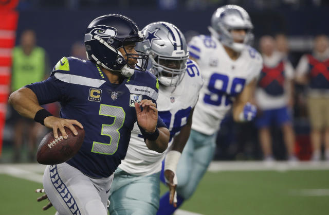 New deal with Seahawks makes Russell Wilson highest-paid NFL