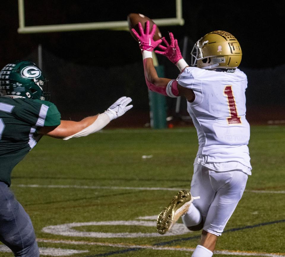 GRAFTON - Doherty’s Juan Reynolds beats Grafton’s Liam Schaker to the pass and runs it in for a touchdown in the fourth quarter Friday, October 6, 2023.