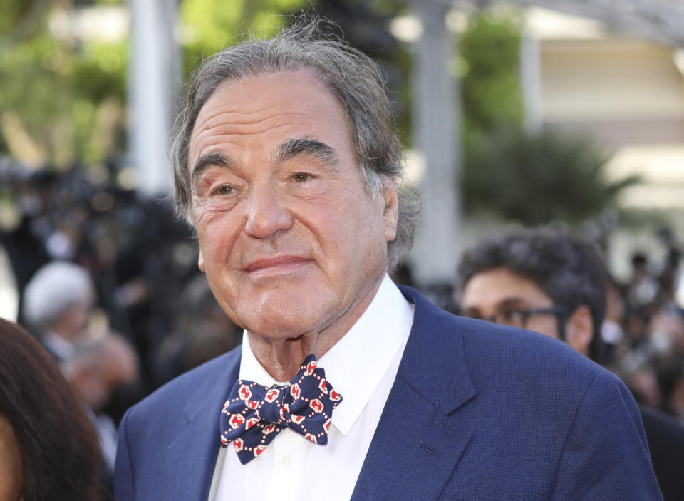 Oliver Stone poses for photographers upon arrival at the awards ceremony and premiere of the closing film 'OSS 117: From Africa with Love' at the 74th international film festival, Cannes, southern France, Saturday, July 17, 2021. (Photo by Vianney Le Caer/Invision/AP)