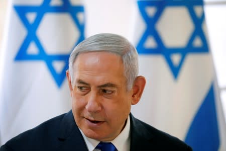 FILE PHOTO: Israeli Prime Minister Benjamin Netanyahu gestures during a weekly cabinet meeting in the Jordan Valley, in the Israeli-occupied West Bank