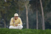 John Pak, of the United States, lines up a putt on the second green during the second round of the US Open Golf Championship, Friday, Sept. 18, 2020, in Mamaroneck, N.Y. (AP Photo/John Minchillo)