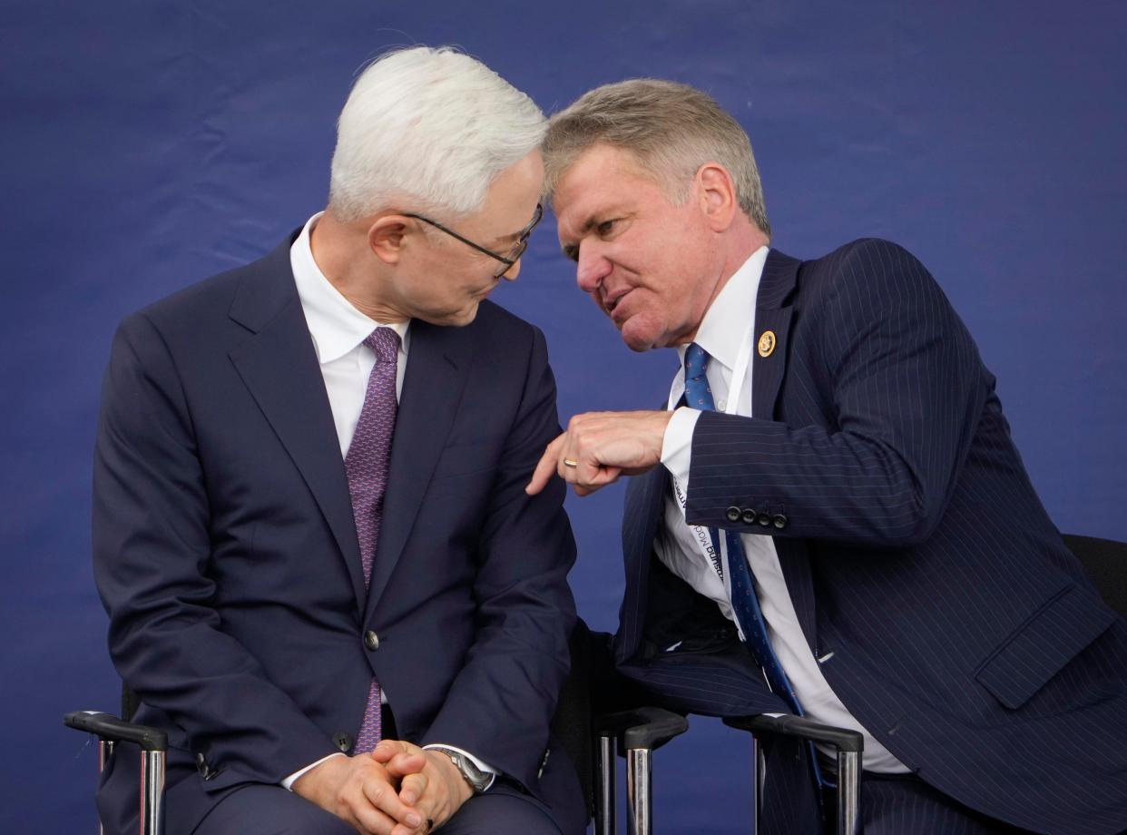 U.S. Rep Michael McCaul, right, talks to Samsung's Kye Hyun Kyung at Monday's event. "This is the epicenter of the technology revolution, the likes of which we have not seen since the Manhattan Project," McCaul told the crowd.