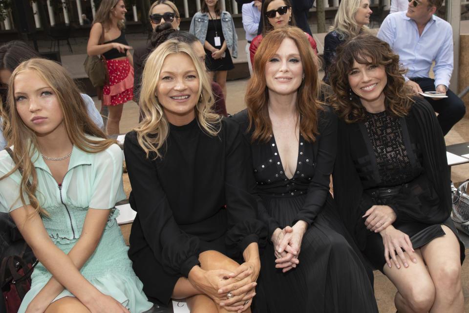 Lila Grace Moss Hack, from left, model Kate Moss, actresses Julianne Moore and Linda Cardellini attend the Longchamp runway show at Lincoln Center during NYFW Spring/Summer 2020 on Saturday, Sept. 7, 2019, in New York. (Photo by Brent N. Clarke/Invision/AP