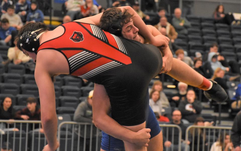 Dolgeville's Jared Bilinski lifts Chittenango Bear Andrew Bailey (left) Feb. 11 during their 189-pound title bout at Section III's Division II championship meet. Bailey is seeded second with Biinski third for the state tournament this weekend.