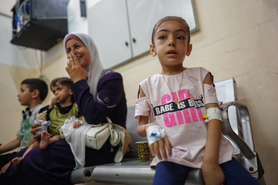 Palestinian children await medical treatment at Nasser Hospital in Khan Younis in the southern Gaza Strip after they were reportedly given permission by the Israeli army to leave the besieged Palestinian territory (AFP via Getty)