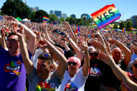 <p>Supporters of the ‘Yes’ vote for marriage equality celebrate after it was announced the majority of Australians support same-sex marriage in a national survey, paving the way for legislation to make the country the 26th nation to formalize the unions by the end of the year, at a rally in central Sydney, Australia, Nov. 15, 2017. (Photo: David Gray/Reuters) </p>