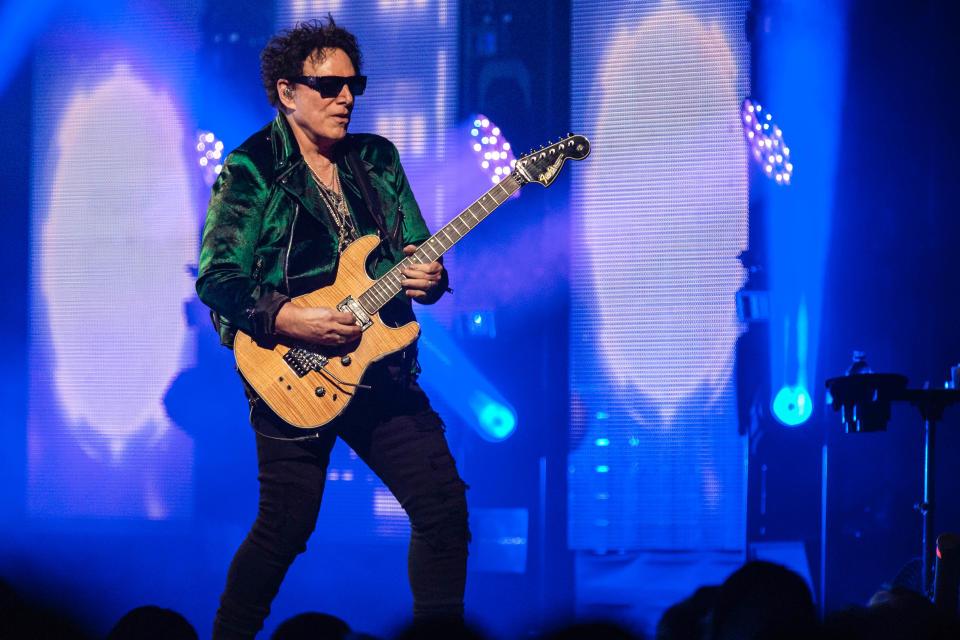 Lead guitarist Neal Schon performs with Journey on the Freedom Tour 2022 at the Paycom Center in Oklahoma City on Thursday. The band is scheduled to perform in Cleveland at Rocket Mortgage FieldHouse on May 7 and in Canton headlining the Concert for Legends on Aug. 6 at Tom Benson Hall of Fame Stadium.