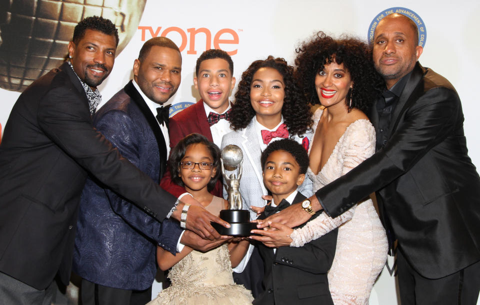Deon Cole, from left, Anthony Anderson, Marsai Martin, Marcus Scribner, Yara Shahidi, Miles Brown, Tracee Ellis Ross, and Kenya Barris pose in the press room with the award for outstanding comedy series for "Black-ish" at the 46th NAACP Image Awards at the Pasadena Civic Auditorium on Friday, Feb. 6, 2015, in Pasadena, Calif. (Photo by Arnold Turner/Invision/AP)
