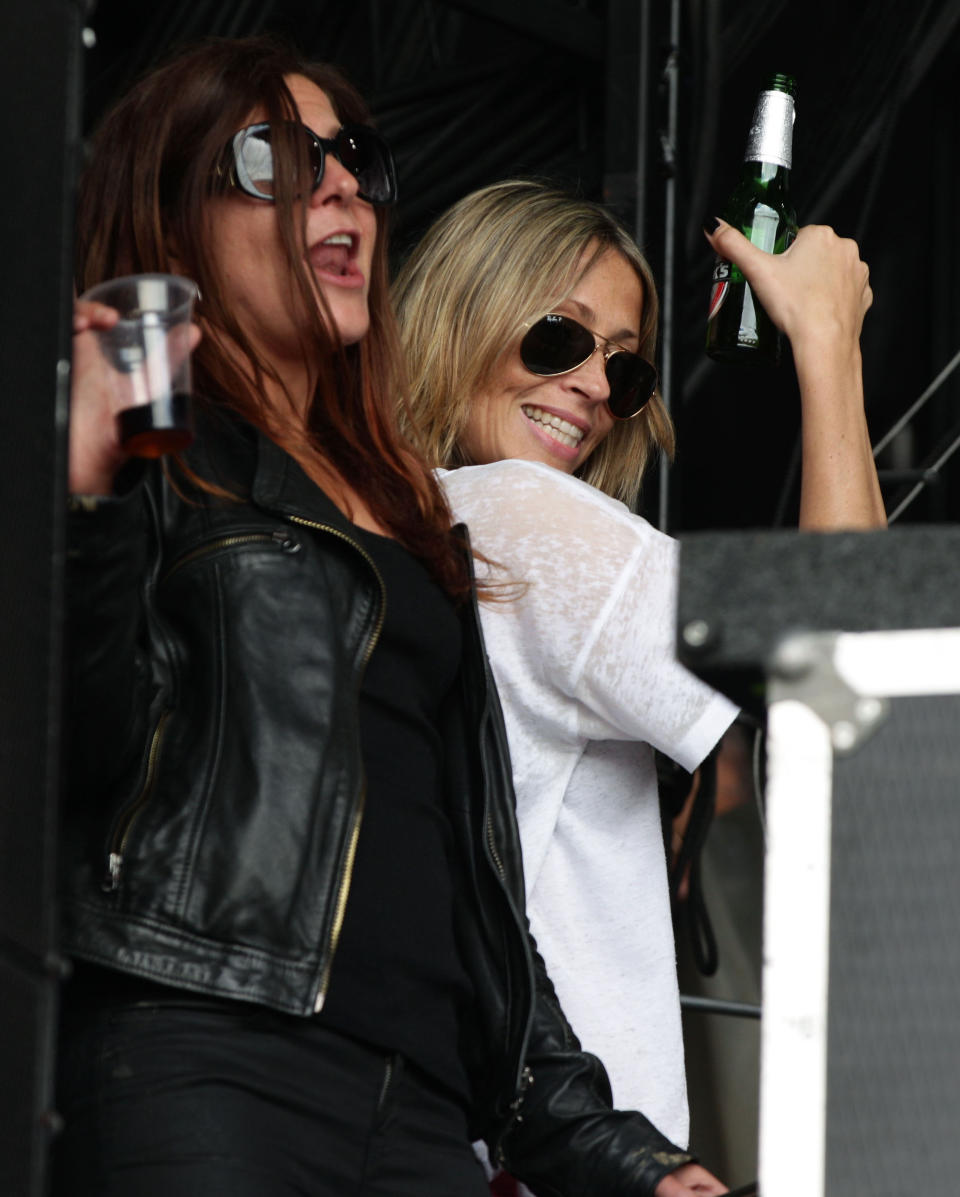 Nicole Appleton (right) watching her husband Liam Gallagher and his band Beady Eye performing on The Other Stage, at the Glastonbury Festival, at Worthy Farm in Somerset.