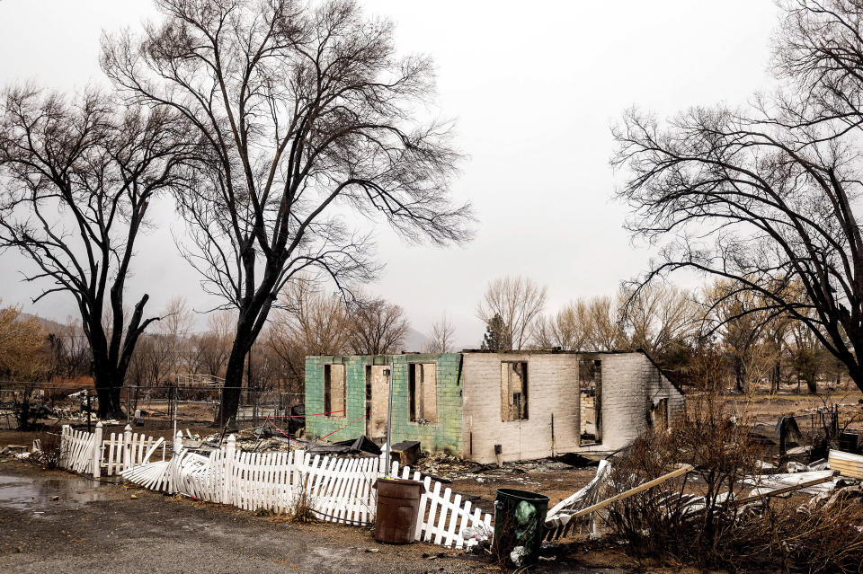 A scorched home rests in a clearing after the Mountain View Fire tore through the Walker community in Mono County, Calif., Wednesday, Nov. 18, 2020. (AP Photo/Noah Berger)