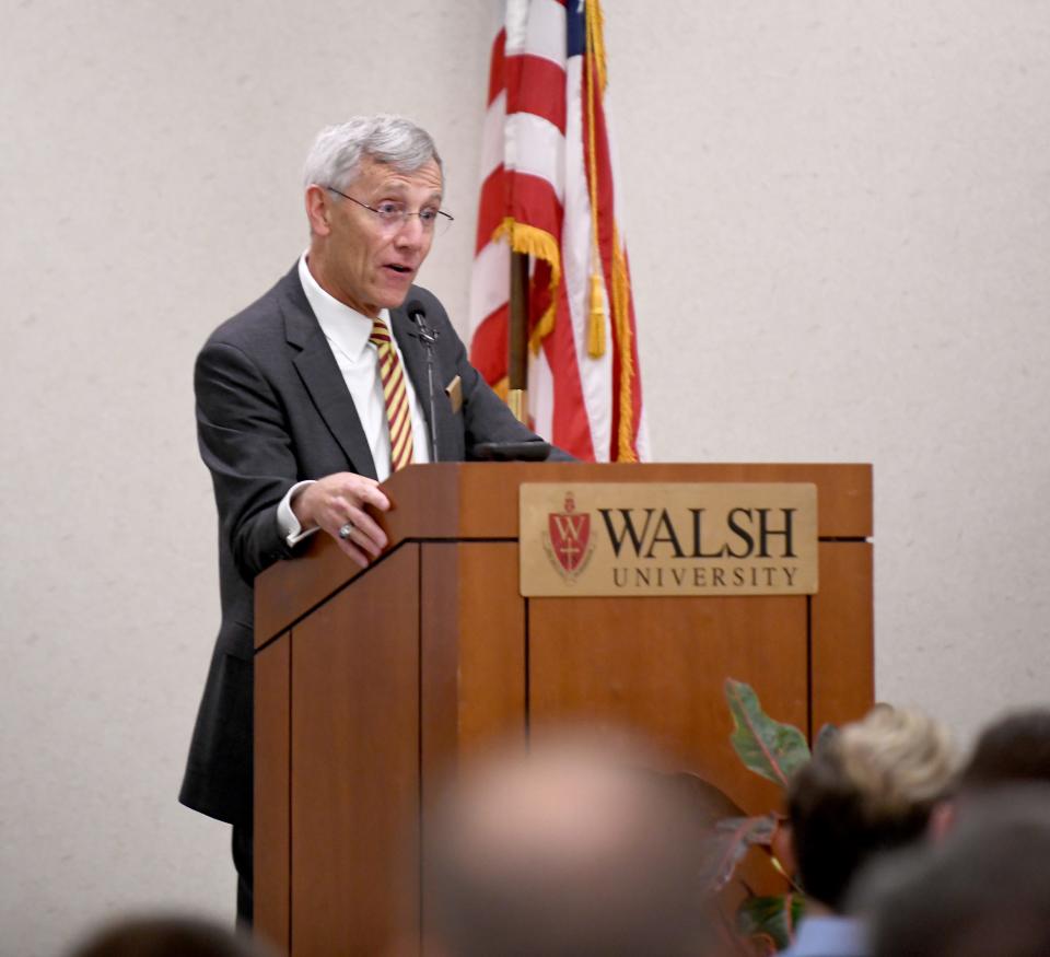 Walsh University President Tim Collins speaks Tuesday during a dedication for the university's SPARQ Analytical Laboratory of Scientific Excellence.