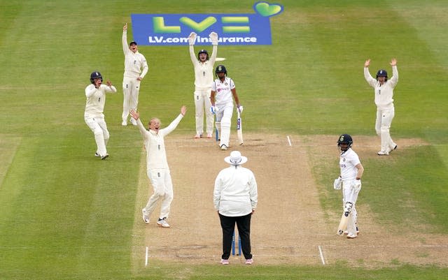 Sophie Ecclestone, centre left, appeals for the wicket of Harmanpreet Kaur