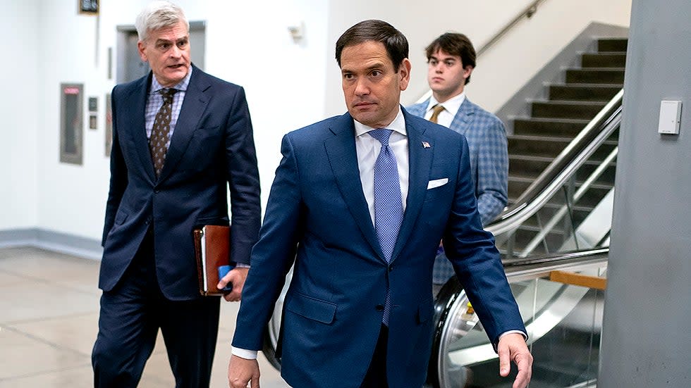 Sens. Bill Cassidy (R-La.) and Marco Rubio (R-Fla.) leave the Capitol following a nomination vote on Wednesday, November 17, 2021.