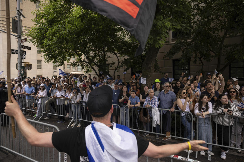 People gather for the annual Israel Day Parade on Fifth Avenue on Sunday, June 2, 2024, in New York. (AP Photo/Yuki Iwamura)