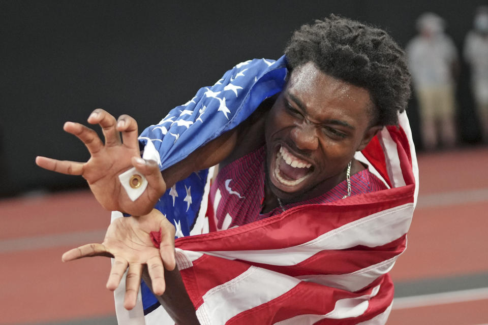 <p>Kenneth Bednarek, of United States, celebrates after his second place finish in the final of the men's 200-meters at the 2020 Summer Olympics, Wednesday, Aug. 4, 2021, in Tokyo. (AP Photo/Matthias Schrader)</p> 