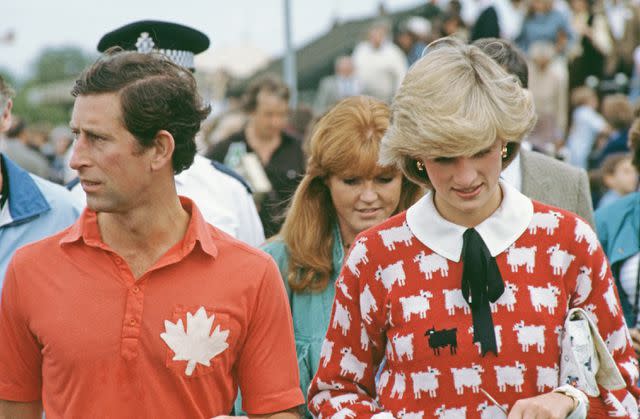 <p>Princess Diana Archive/Getty</p> Princess Diana and Prince Charles (with Sarah, Duchess of York) in 1983