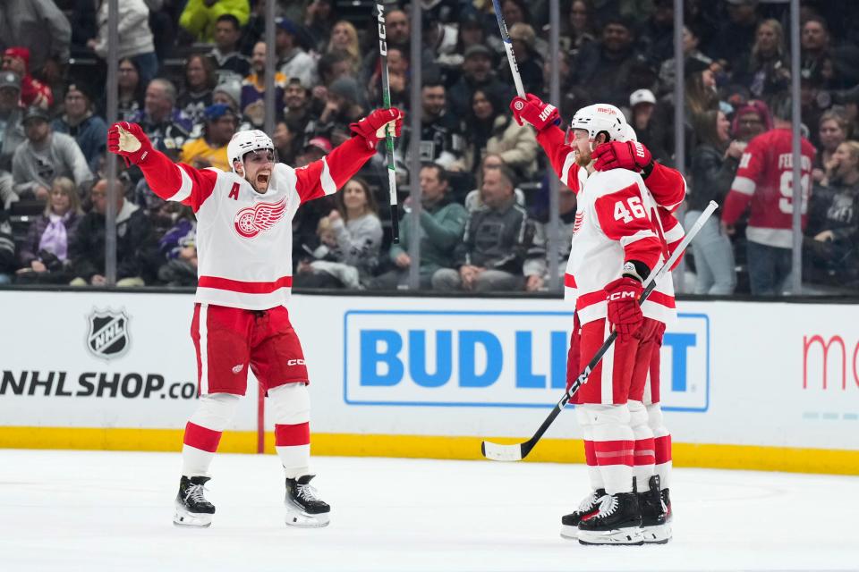 Detroit Red Wings left wing David Perron, left, celebrates a goal by defenseman Jeff Petry, right, against the Los Angeles Kings during the second period at Crypto.com Arena in Los Angeles on Thursday, Jan. 4, 2024.