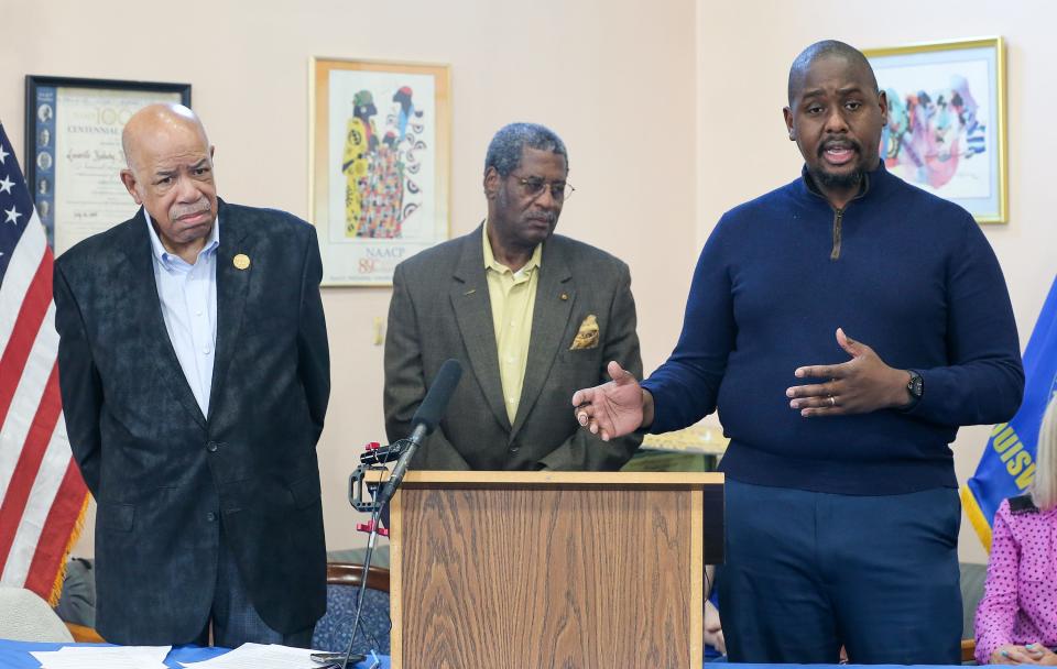 Raoul Cunningham and Raymond Burse, with the NAACP, and Lyndon Pryor, with the Urban League, make statements concerning JCPS’ new busing strategy.