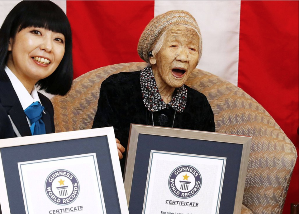 Japan’s Kane Tanaka, now the world’s oldest person at age 116, is pictured receiving her official Guinness World Records plaque at her nursing home. (Photo: @CGTNOfficial via Twitter)