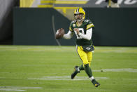 Green Bay Packers quarterback Aaron Rodgers (12) looks to throw during the second half of an NFL football game against the Atlanta Falcons, Monday, Oct. 5, 2020, in Green Bay, Wis. (AP Photo/Mike Roemer)