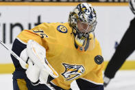 Nashville Predators goaltender Pekka Rinne (35) stops a shot by the Florida Panthers during the first period of an NHL hockey game Thursday, March 4, 2021, in Nashville, Tenn. (AP Photo/Mark Zaleski)