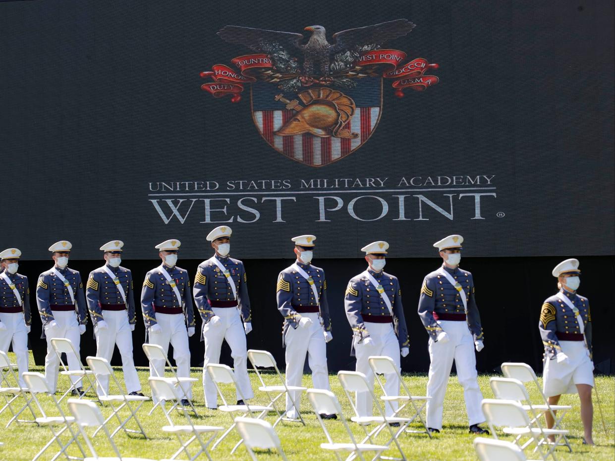<p>Graduating cadets march to their socially-distanced seating during commencement ceremonies in West Point, New York last June</p> (AP)
