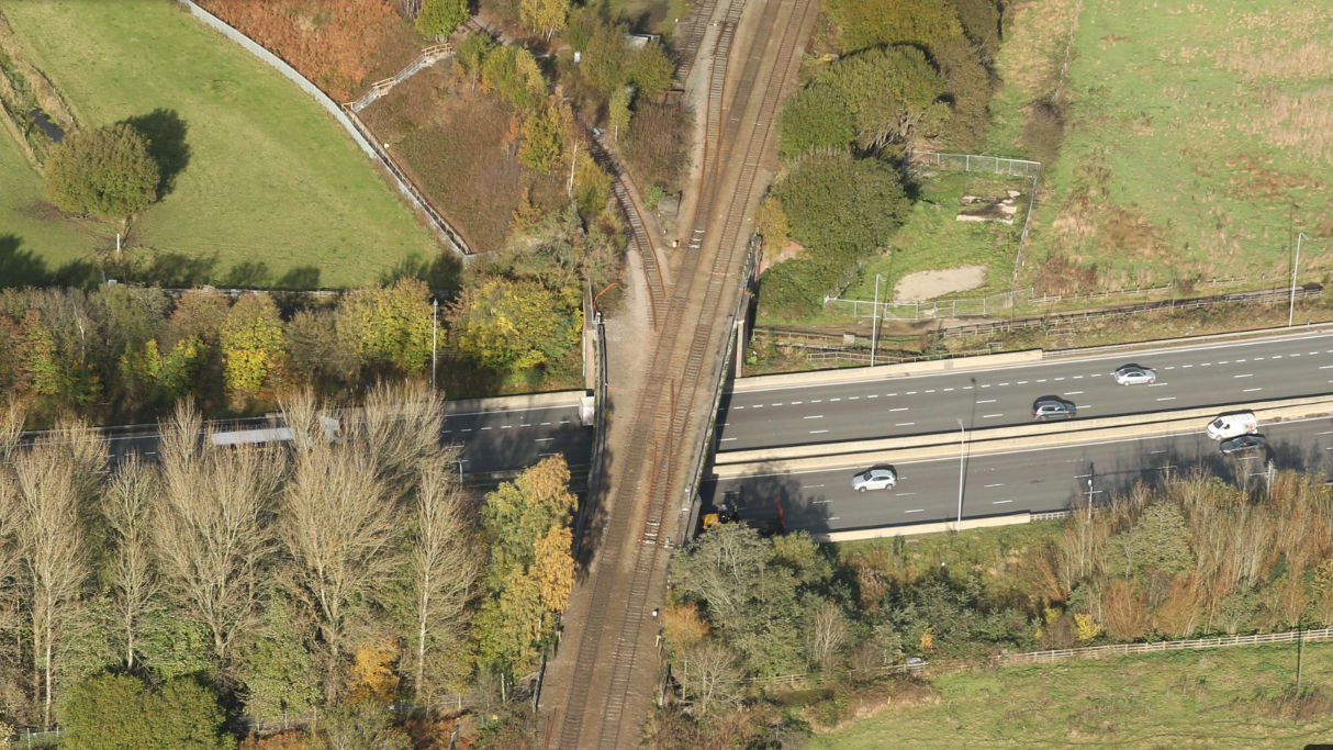 Passengers and motorists are urged to check before they travel this September as Network Rail carries out a multi-million-pound bridge replacement.

Network Rail is investing more than £22m to rebuild a 42-metre-long, 2000 tonne railway bridge that takes trains over the M62 in Castleton, near Rochdale.

For the first time in living memory, the M62 will be closed over two weekends.

The closures are on the eastbound carriageway between J18 and J20 and the westbound carriageway between J19 and J20:

9pm Friday 6 – 6am Monday 9 September
9pm Friday 20 – 6am Monday 23 September

(Network Rail) 