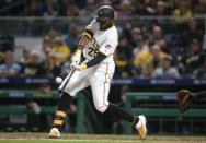 FILE PHOTO: Apr 22, 2019; Pittsburgh, PA, USA; Pittsburgh Pirates right fielder Gregory Polanco (25) hits a double against the Arizona Diamondbacks during the fifth inning at PNC Park. Mandatory Credit: Charles LeClaire-USA TODAY Sports