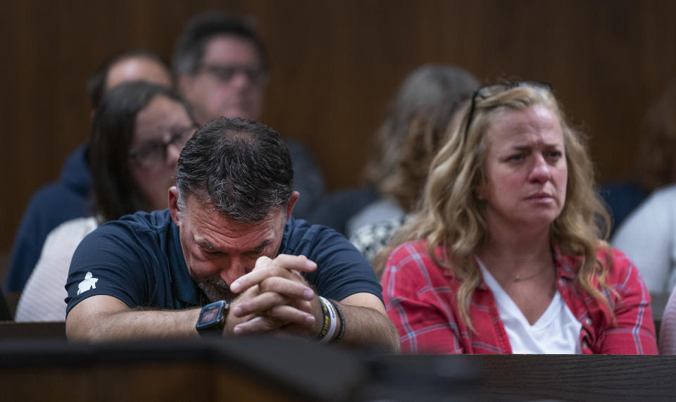 Buck Myre, left, and Sheri Myre parents of slain son Tate Myre, listen to testimony as their son's killer, Ethan Crumbley appears in the Oakland County courtroom of Kwame Rowe, on Aug. 18, 2023, in Pontiac, Mich. The teenager who killed four students at Michigan’s Oxford High School will learn whether he will spend his life in prison or get a chance for parole in the decades ahead. Judge Kwame Rowe will announce his decision Friday, Sept. 29. (Mandi Wright/Detroit Free Press via AP, Pool)