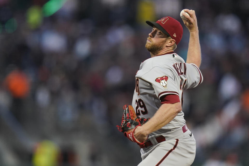 Arizona Diamondbacks' Merrill Kelly pitches against the San Francisco Giants during the fourth inning of a baseball game in San Francisco, Tuesday, Aug. 16, 2022. (AP Photo/Godofredo A. Vásquez)