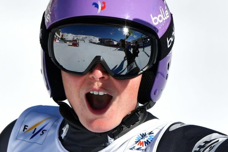 France's Tessa Worley celebrates after winning her fourth world ski title durin the giant slalom in St Moritz, on February 16, 2017