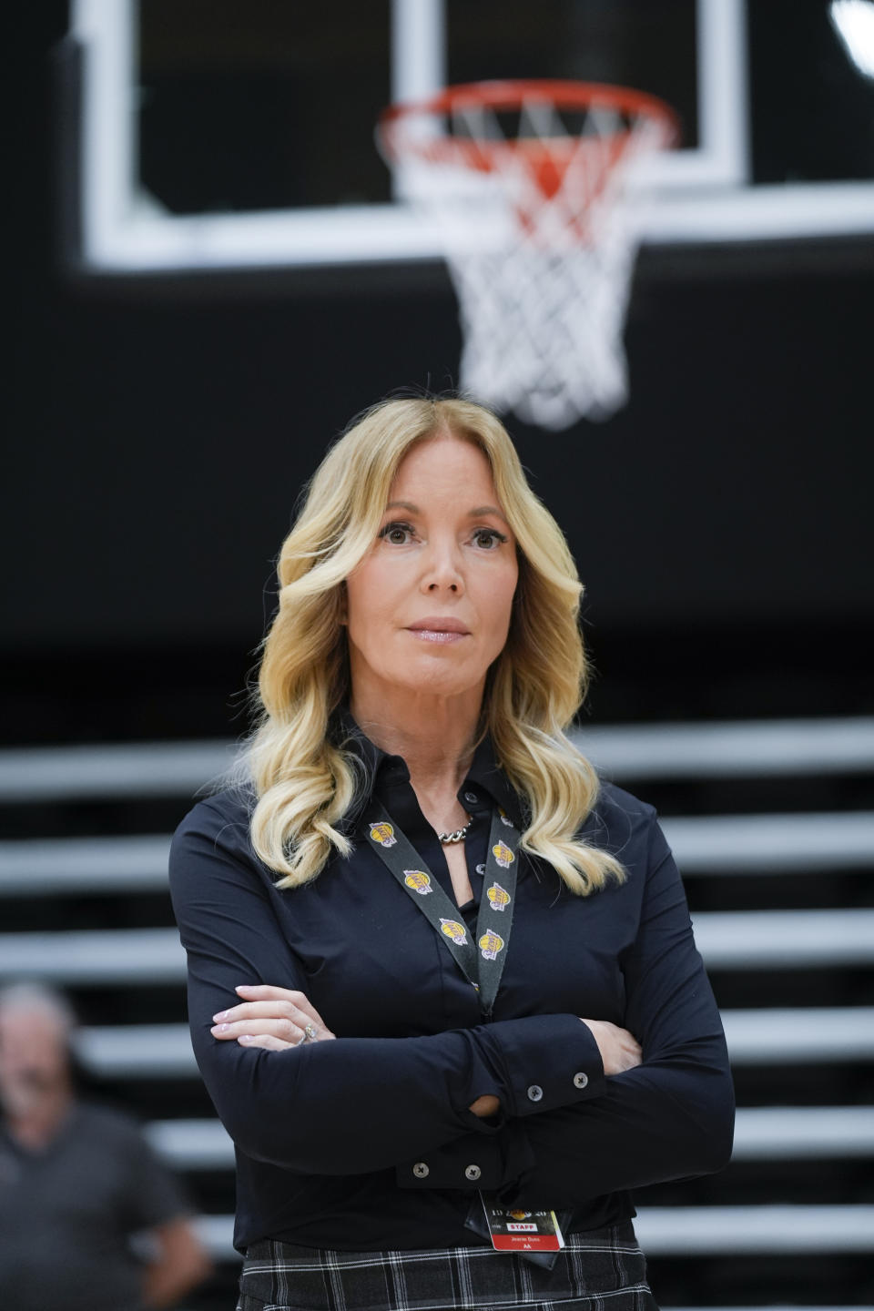 Los Angeles Lakers owner Jeanie Buss listens to JJ Redick speak after Redick was introduced as the NBA basketball team's new head coach Monday, June 24, 2024, in El Segundo, Calif. (AP Photo/Damian Dovarganes)