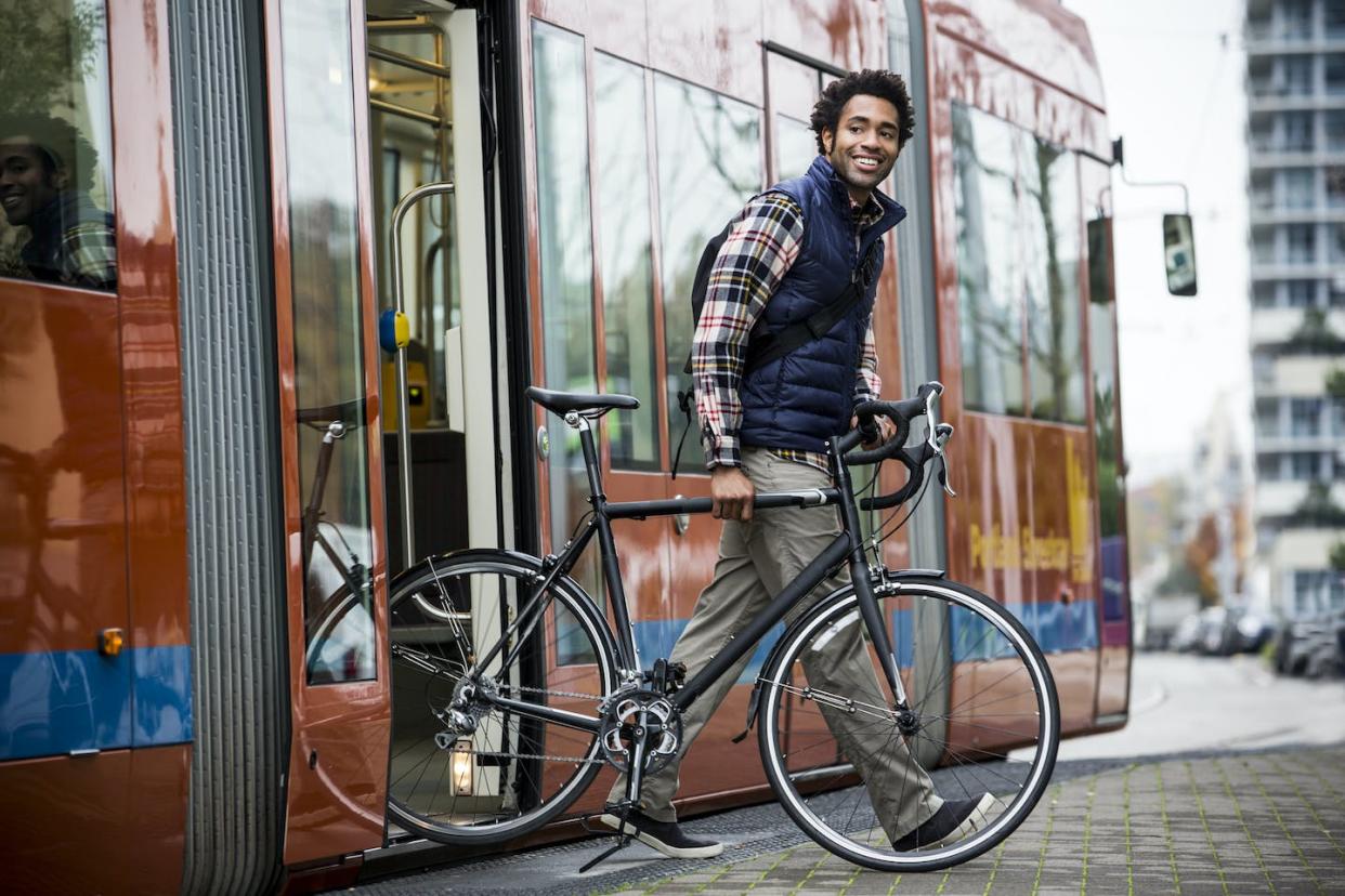 Changes in behavior can lead to significant emission reductions. <a href="https://www.gettyimages.com/detail/photo/man-bike-commuting-royalty-free-image/158295595?phrase=commuter+and+bicycle&adppopup=true" rel="nofollow noopener" target="_blank" data-ylk="slk:Getty Images;elm:context_link;itc:0;sec:content-canvas" class="link ">Getty Images</a>
