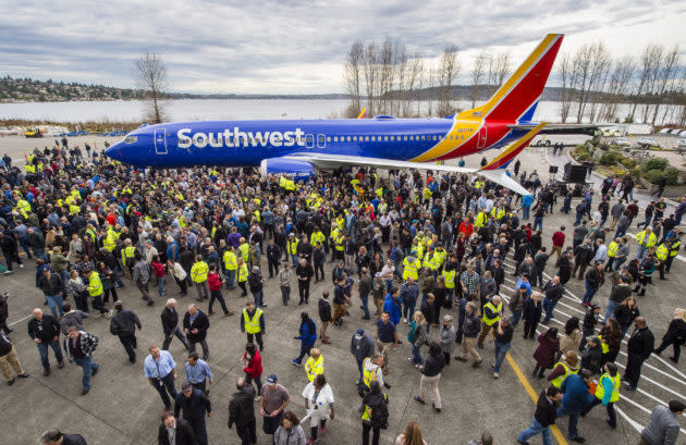 Boeing employees surround the 10,000th 737 jet — a 737 MAX 8 built for Southwest Airlines — during a ceremony in Renton, Wash., in March 2018. (Boeing Photo)