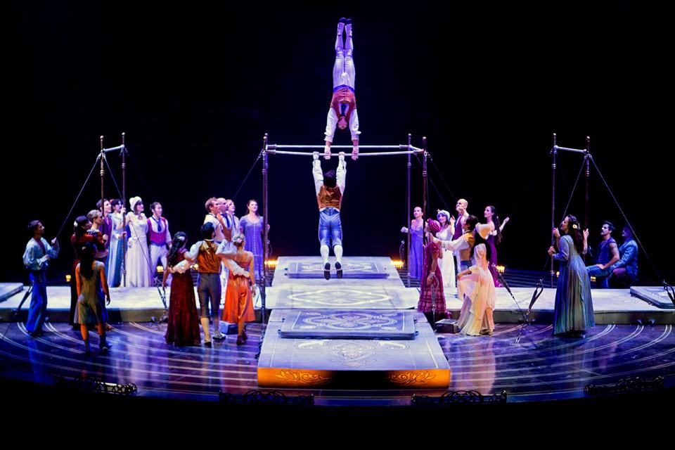 Former OU gymnast David Henderson performs in Cirque du Soleil's production of Corteo. Photo by Maga Prgomet