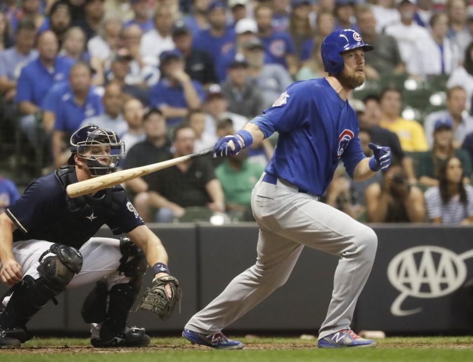 Chicago Cubs' Ben Zobrist hits an RBI double during the fourth inning of a baseball game against the Milwaukee Brewers Wednesday, Sept. 5, 2018, in Milwaukee. (AP Photo/Morry Gash)