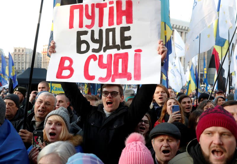 People take part in a rally ahead of the so-called "Normandy" format summit, in Kiev