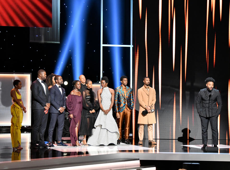 HOLLYWOOD, CALIFORNIA - MARCH 30: Vin Diesel (back center) listens while (from L) Carrie Bernans, Winston Duke, Sterling K. Brown, Lupita Nyong'o, Letitia Wright, Danai Gurira, Chadwick Boseman, Michael B. Jordan, and Ryan Coogler accept the Outstanding Motion Picture award for 'Black Panther' onstage at the 50th NAACP Image Awards at Dolby Theatre on March 30, 2019 in Hollywood, California. (Photo by Earl Gibson III/Getty Images for NAACP)