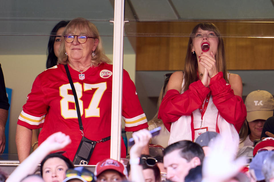 Taylor Swift cheers from a suite with Travis Kelce's mother, Donna Kelce, at Sunday's Kansas City Chiefs game. (Cooper Neill / AP)