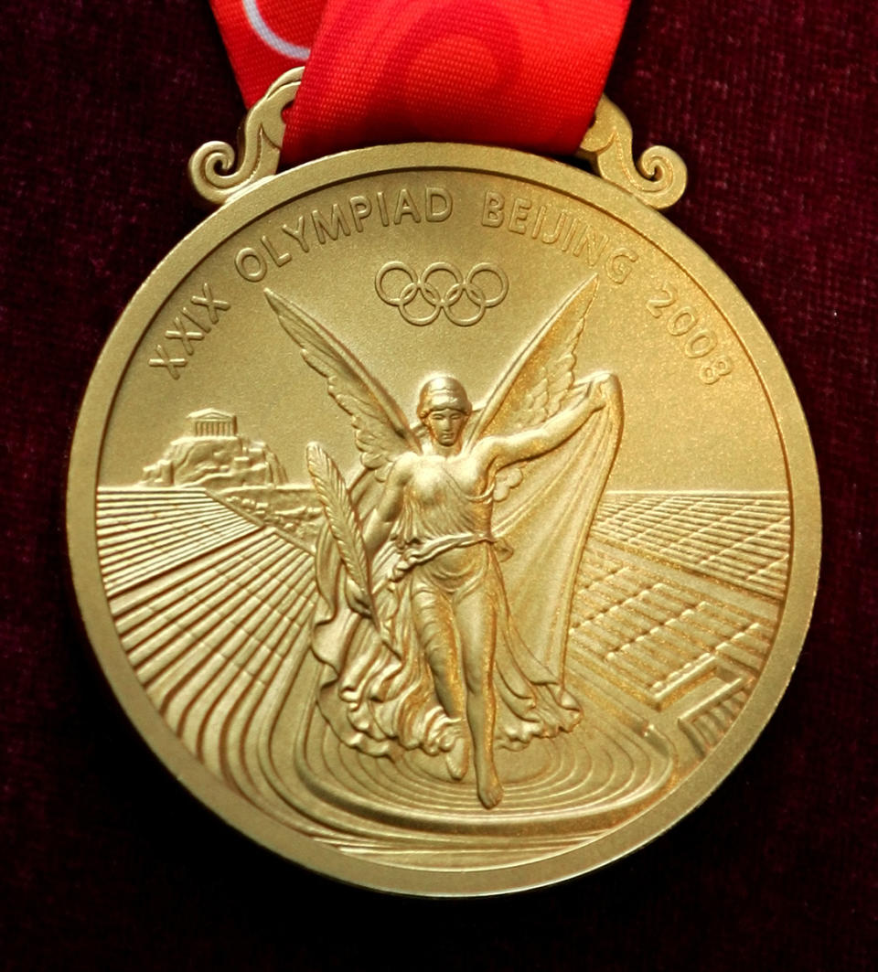 <p>The gold medal for the 2008 Beijing Olympic Games. (Greg Baker/AP) </p>