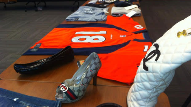 Toronto police display some of the counterfeit items that were seized in recent weeks.