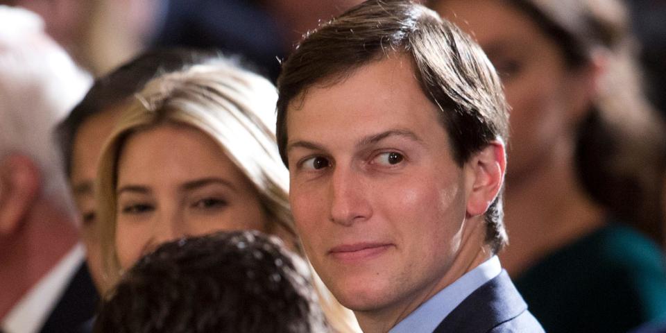 Jared Kushner looking to the left in a crowd of people next to Ivanka Trump.